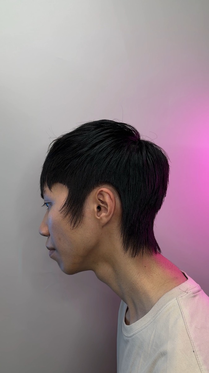 Scissor-cut layered fringe with a tapered neckline