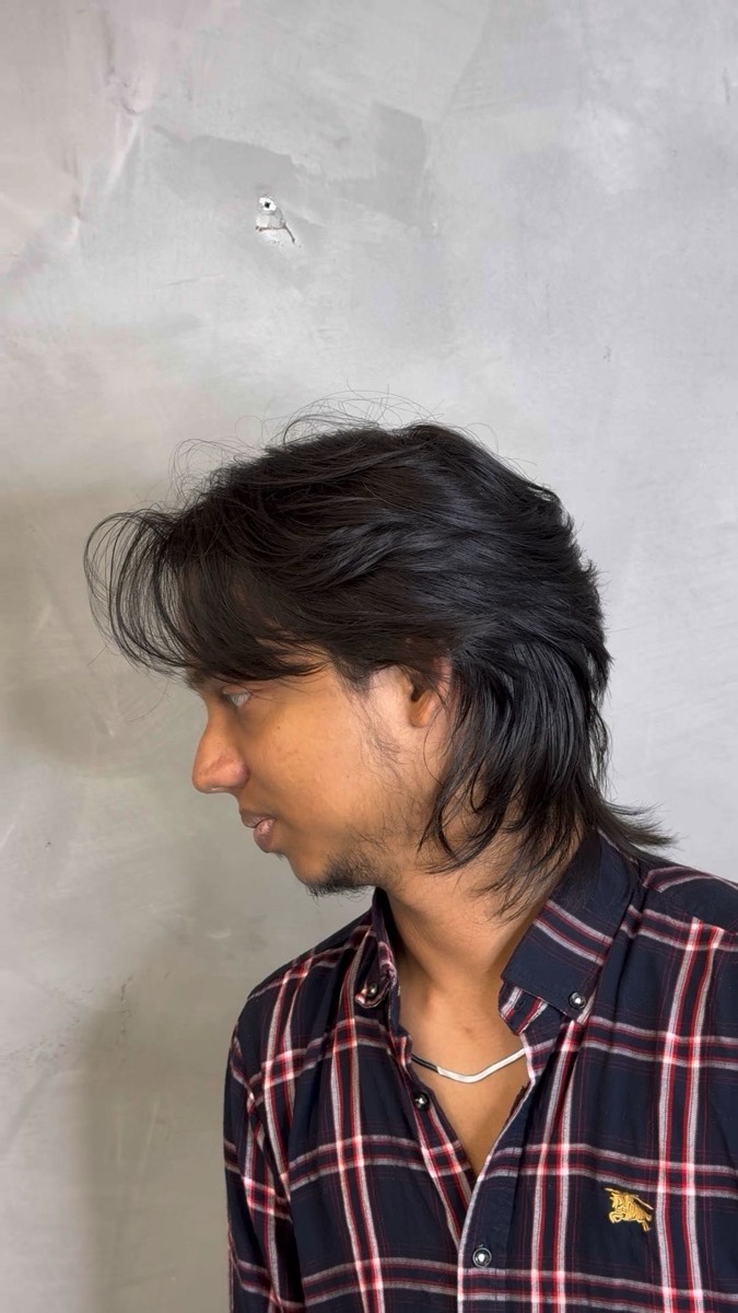 Long layered scissor cut with curtain fringe